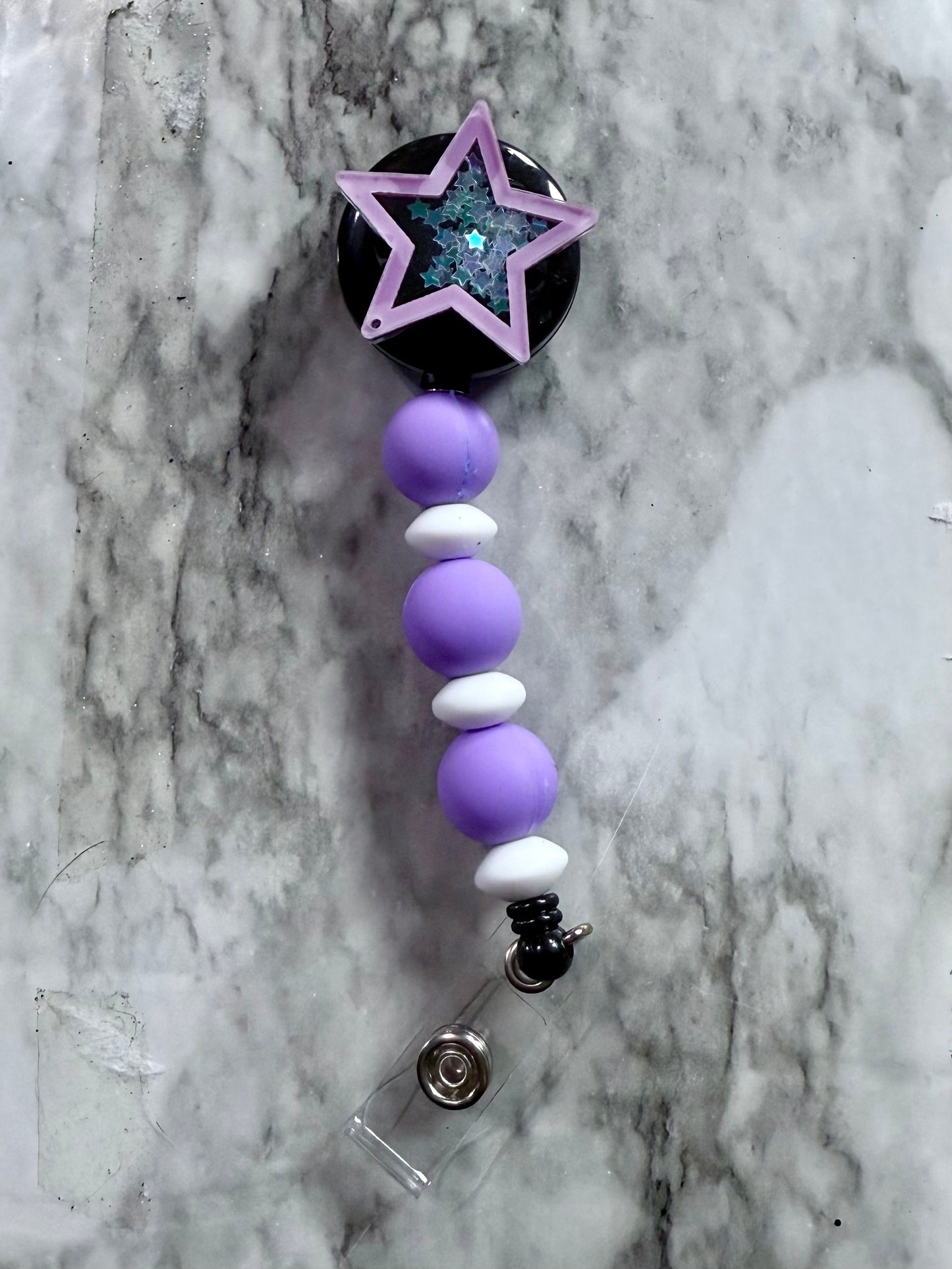 Purple Star Shaker Badge Reel Clip