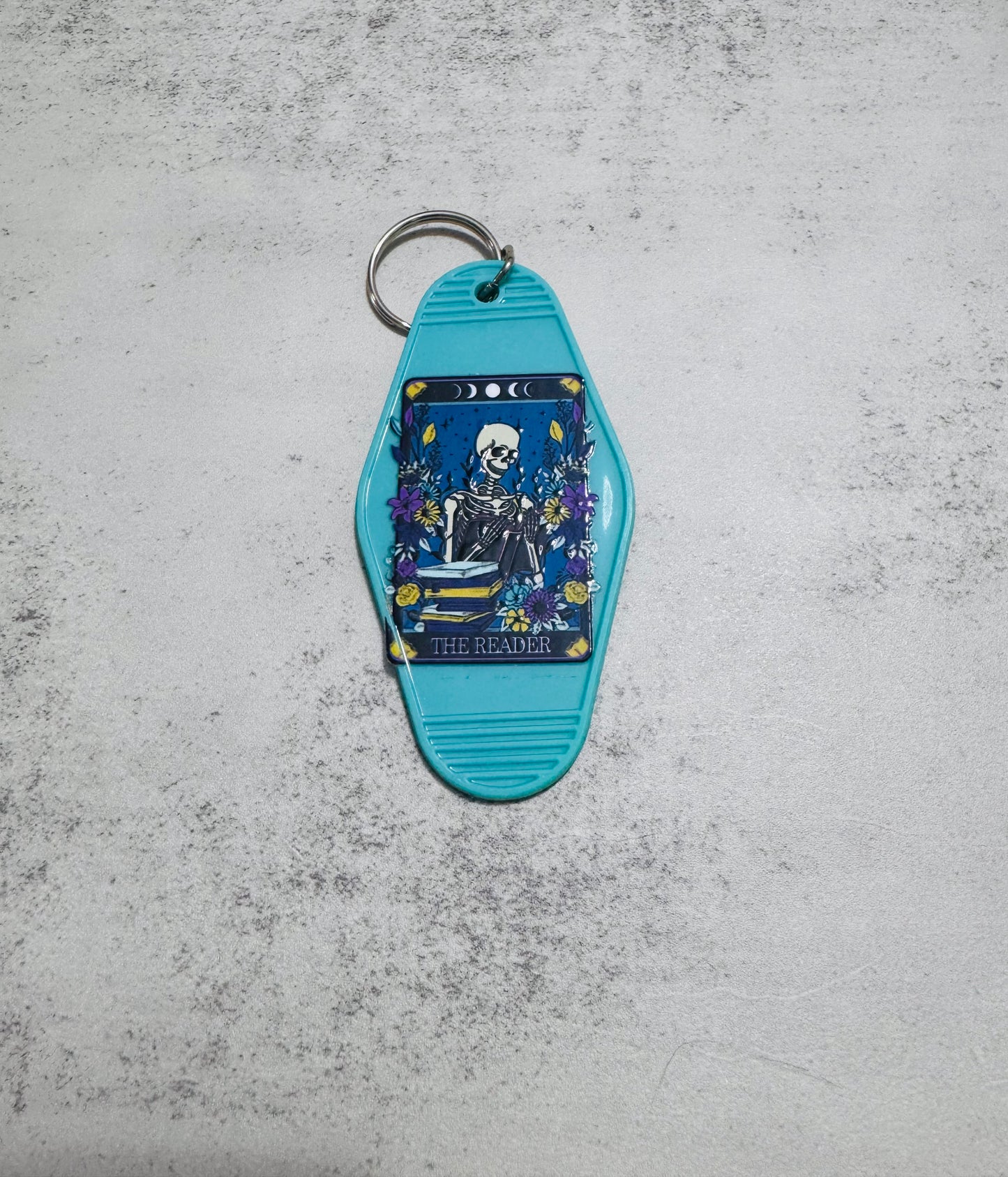 The reader Motel Keychain