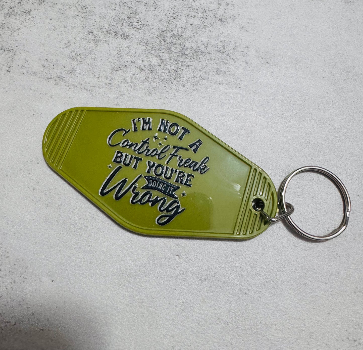 Control Freak Motel Keychain