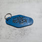 The reader Motel Keychain