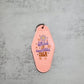 Smile it confuses them Motel Keychain