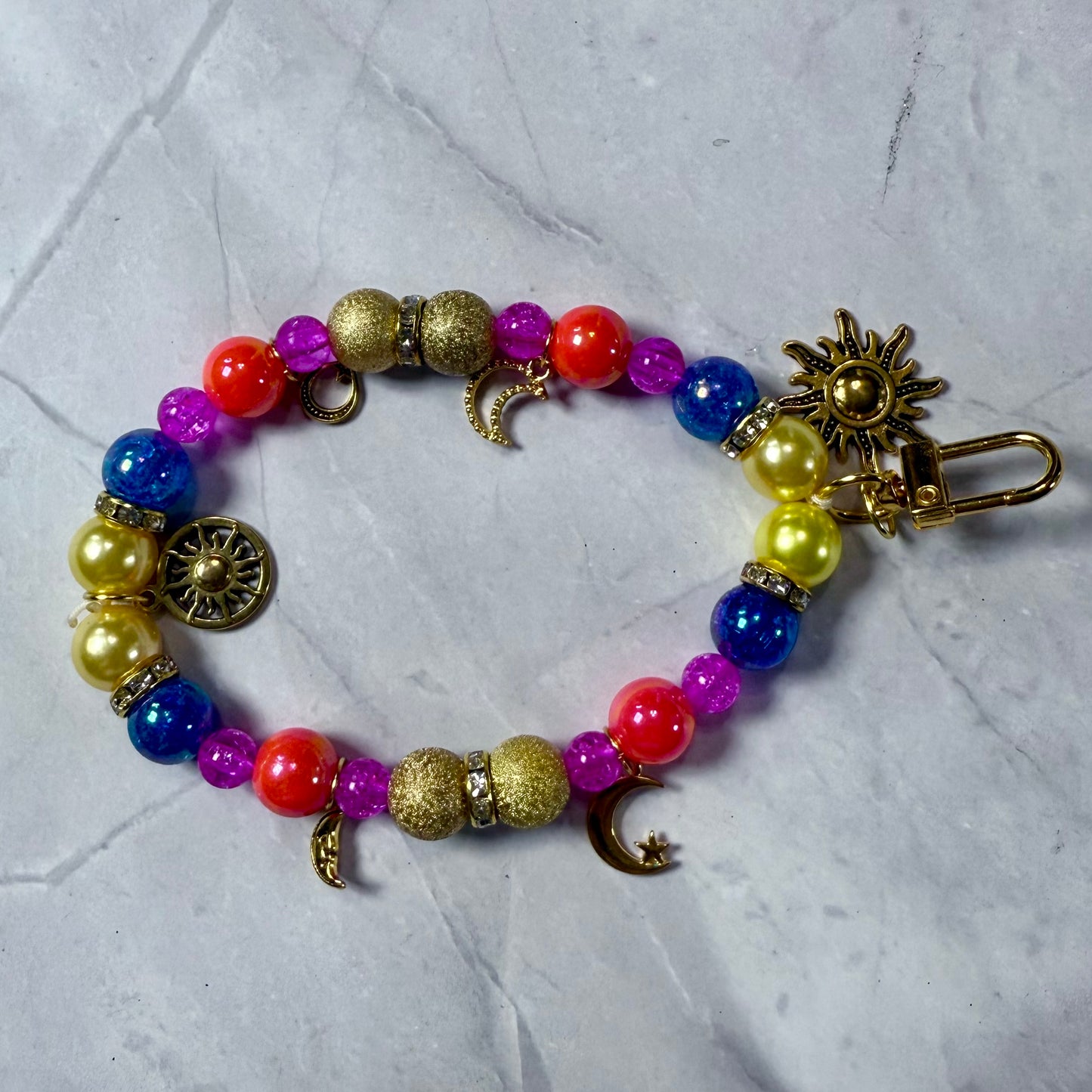 Sun and Moon Gold Wristlet